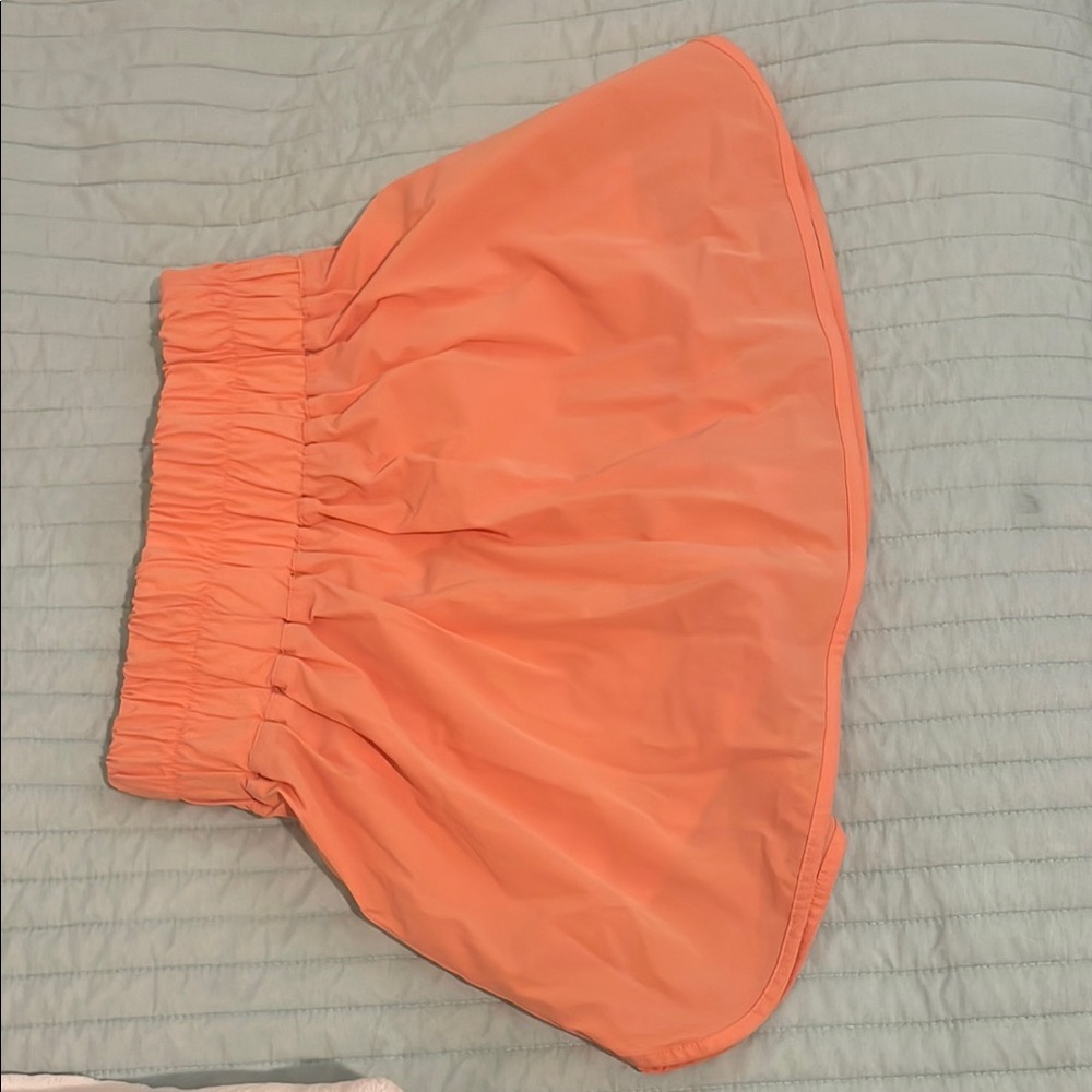 gold hinge orange skirt